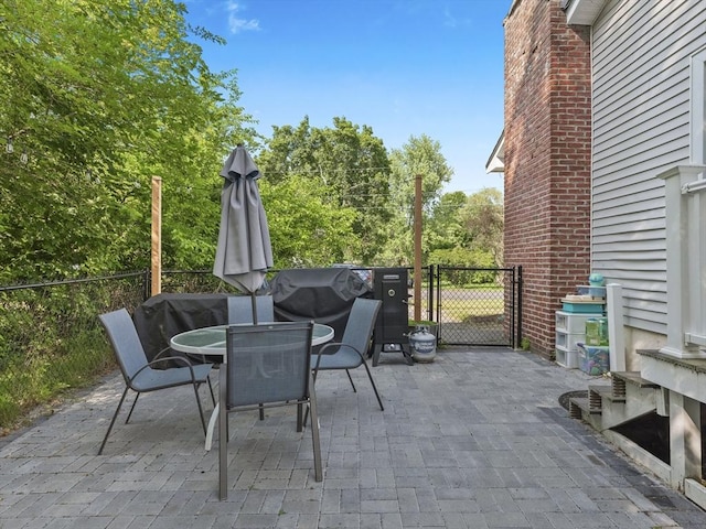 20 Dunshire Dr, Chelmsford, MA 01863 - view of patio / terrace featuring outdoor dining area, a gate, and area for grilling