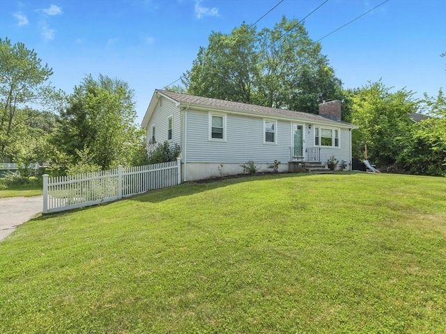 20 Dunshire Dr, Chelmsford, MA 01863 - view of front of home with a chimney