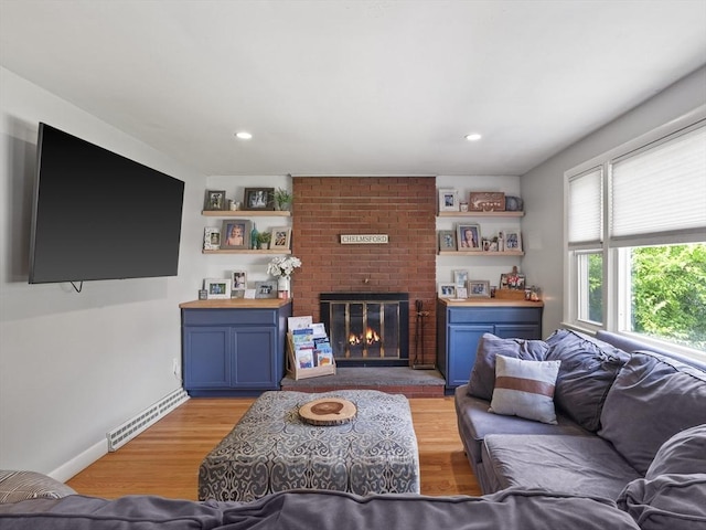 20 Dunshire Dr, Chelmsford, MA 01863 - living room with light wood-style flooring, a brick fireplace, and recessed lighting