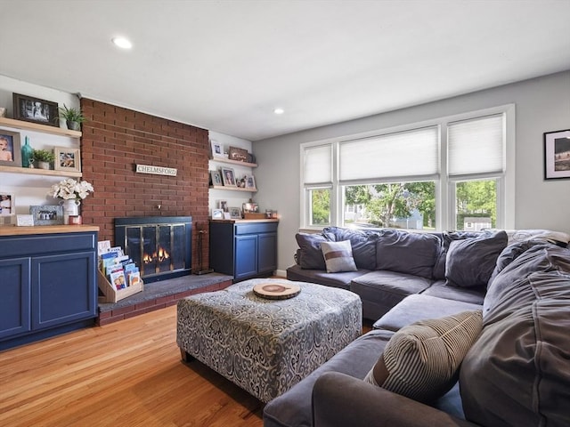 20 Dunshire Dr, Chelmsford, MA 01863 - living area featuring light wood finished floors, a fireplace, and recessed lighting