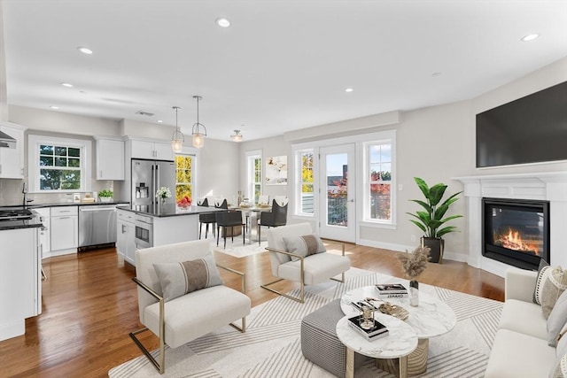22 Chickatawbut St Unit 2, Boston, MA 02122 - living area with recessed lighting, a wealth of natural light, and wood finished floors