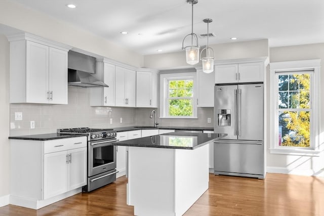 22 Chickatawbut St Unit 2, Boston, MA 02122 - kitchen with a sink, white cabinets, wall chimney range hood, and premium appliances