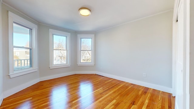 spare room featuring light wood-type flooring