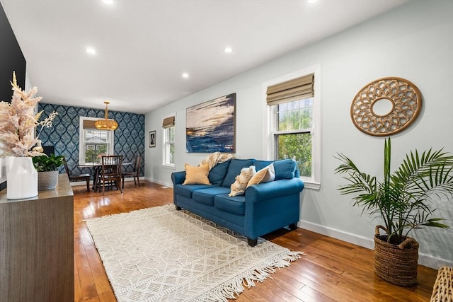 55 Rosemont Rd, Weymouth, MA 02191 - living area featuring an accent wall, wallpapered walls, healthy amount of natural light, wood-type flooring, and recessed lighting
