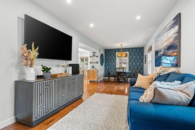 55 Rosemont Rd, Weymouth, MA 02191 - living room with an accent wall, wood finished floors, recessed lighting, and wallpapered walls