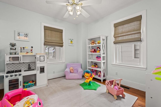 55 Rosemont Rd, Weymouth, MA 02191 - playroom with ceiling fan and wood finished floors