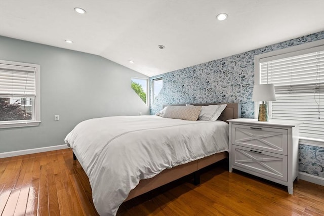 55 Rosemont Rd, Weymouth, MA 02191 - bedroom featuring wood finished floors, vaulted ceiling, recessed lighting, and wallpapered walls
