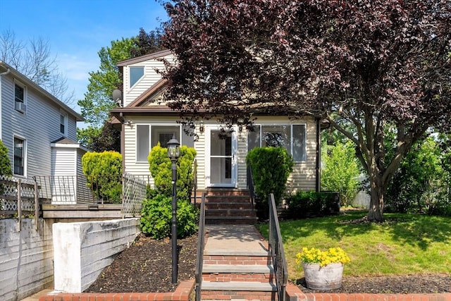 55 Rosemont Rd, Weymouth, MA 02191 - view of property hidden behind natural elements with a front lawn and entry steps