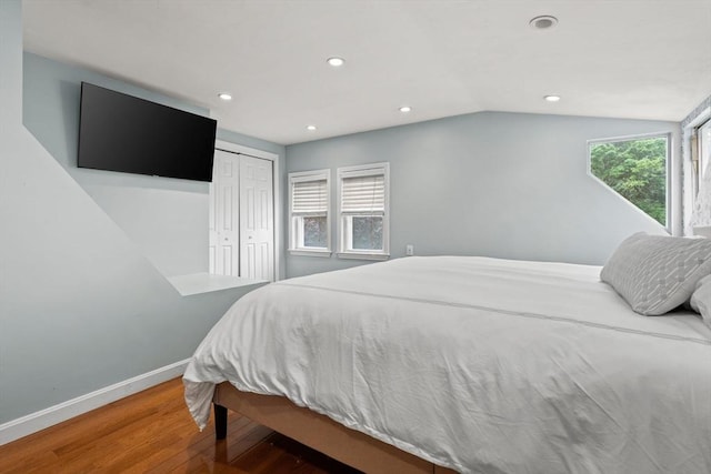 55 Rosemont Rd, Weymouth, MA 02191 - bedroom with wood finished floors, recessed lighting, a closet, and vaulted ceiling
