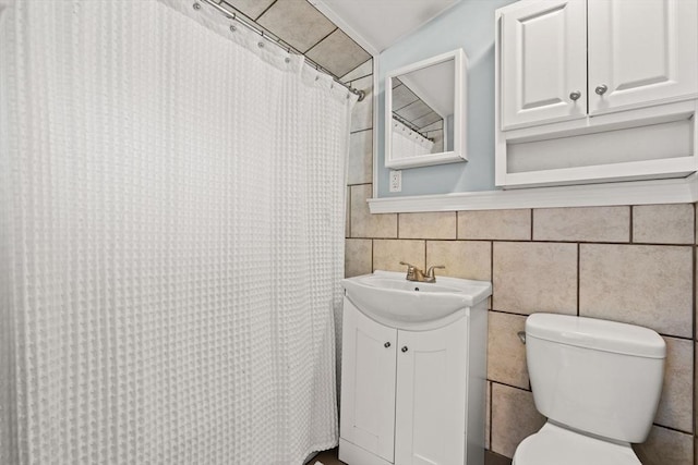 55 Rosemont Rd, Weymouth, MA 02191 - bathroom with tile walls, vanity, and a shower with curtain
