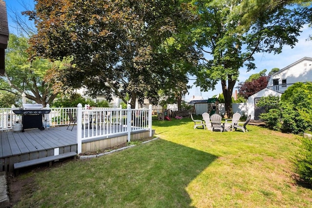 55 Rosemont Rd, Weymouth, MA 02191 - fenced backyard featuring a deck and a playground