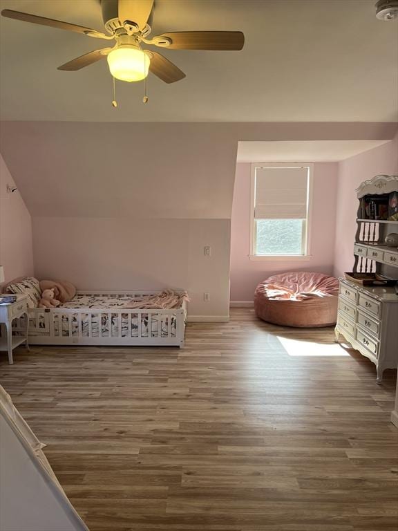 106 Shaw Rd, Goshen, MA 01330 - bedroom with wood finished floors, lofted ceiling, ceiling fan, and baseboards