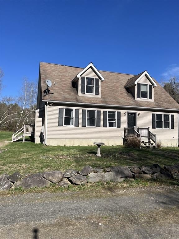 106 Shaw Rd, Goshen, MA 01330 - cape cod-style house featuring a front lawn