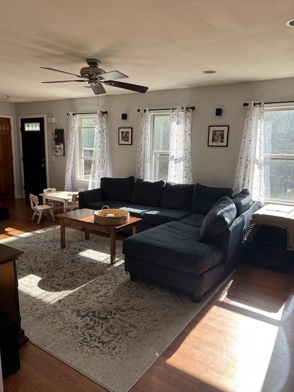 106 Shaw Rd, Goshen, MA 01330 - living room featuring plenty of natural light, wood finished floors, and a ceiling fan