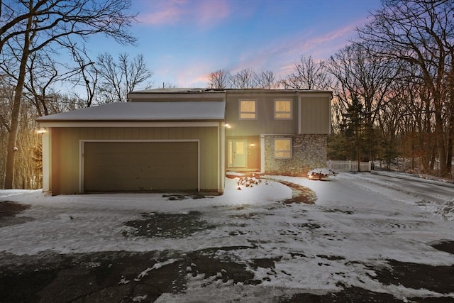 view of front of property with a garage