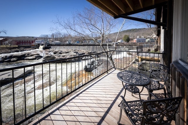 balcony featuring a mountain view