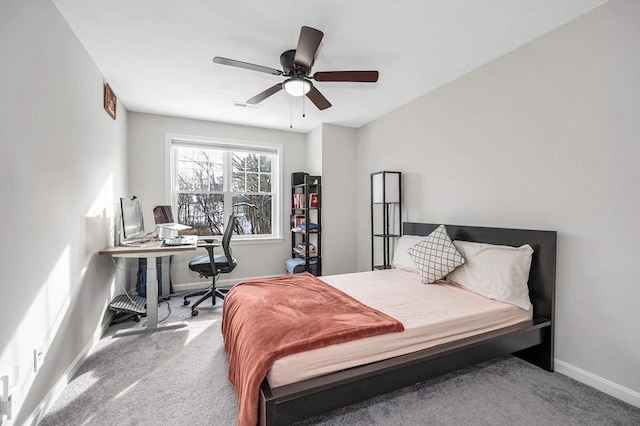 bedroom featuring carpet floors, visible vents, baseboards, and ceiling fan