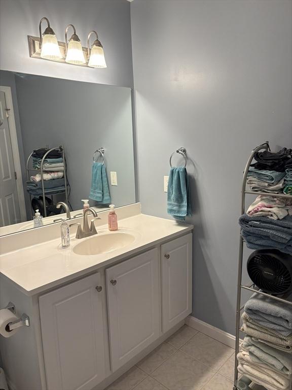 48 Phillips Rd Unit 17, Holden, MA 01520 - bathroom with tile patterned flooring and vanity