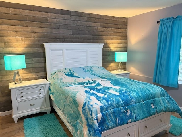 48 Phillips Rd Unit 17, Holden, MA 01520 - bedroom featuring wood walls and wood finished floors