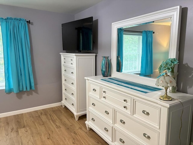48 Phillips Rd Unit 17, Holden, MA 01520 - bedroom with light wood-style flooring and baseboards