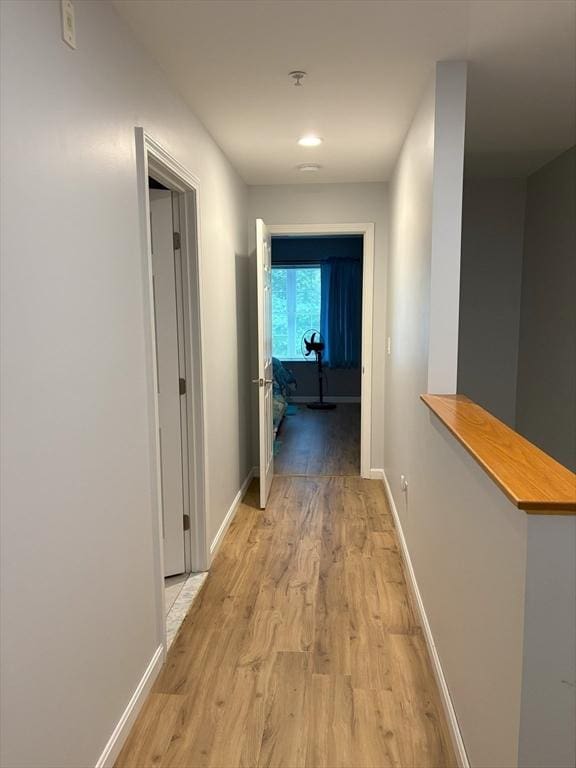 48 Phillips Rd Unit 17, Holden, MA 01520 - corridor featuring light wood-type flooring and baseboards