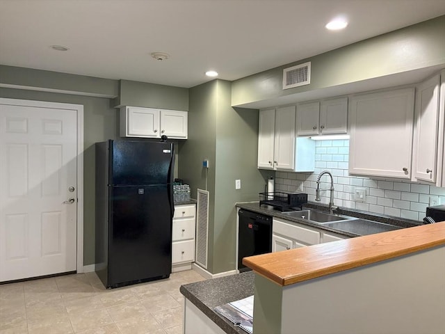 48 Phillips Rd Unit 17, Holden, MA 01520 - kitchen with black appliances, tasteful backsplash, recessed lighting, light tile patterned flooring, and white cabinetry