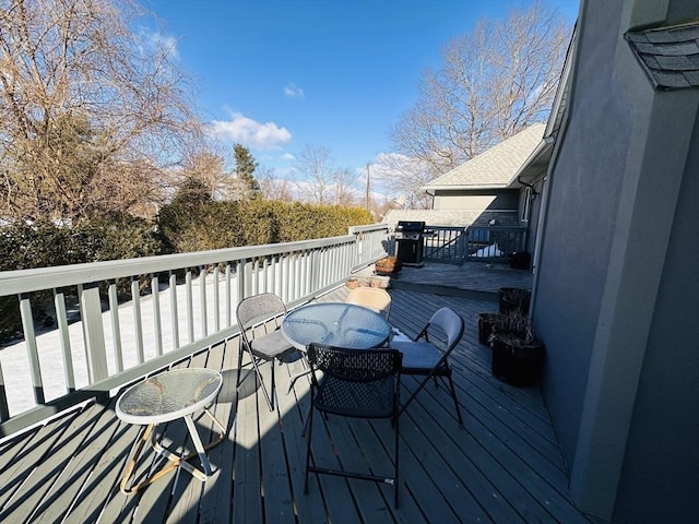 deck with area for grilling