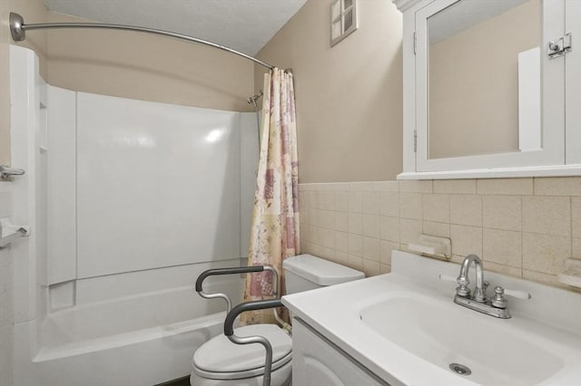 875 John Fitch Hwy Unit 23, Fitchburg, MA 01420 - full bathroom with vanity, shower / bath combination with curtain, and tile walls