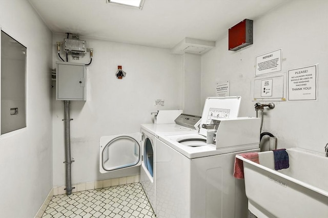 875 John Fitch Hwy Unit 23, Fitchburg, MA 01420 - community laundry with baseboards and washer and dryer