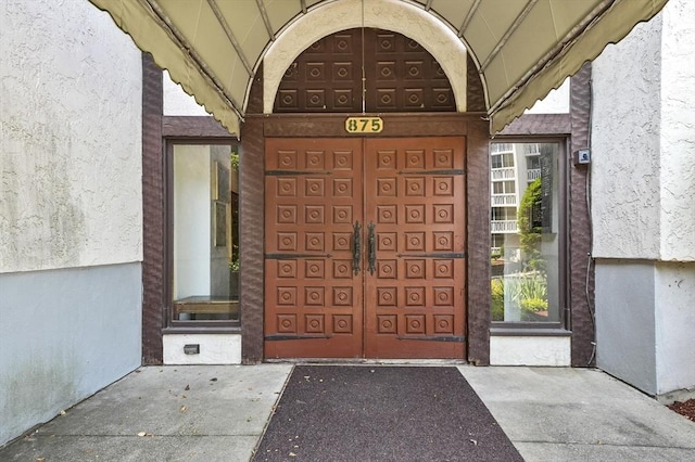 875 John Fitch Hwy Unit 23, Fitchburg, MA 01420 - property entrance featuring stucco siding