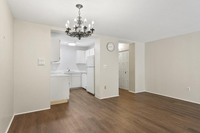 875 John Fitch Hwy Unit 23, Fitchburg, MA 01420 - interior space with a chandelier and dark wood-style floors