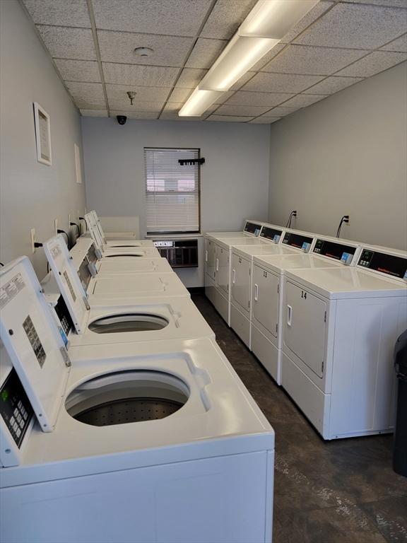 washroom featuring washer and dryer