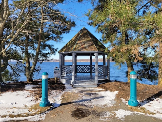 view of dock featuring a water view and a gazebo