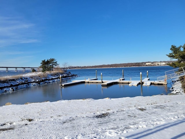 view of dock with a water view