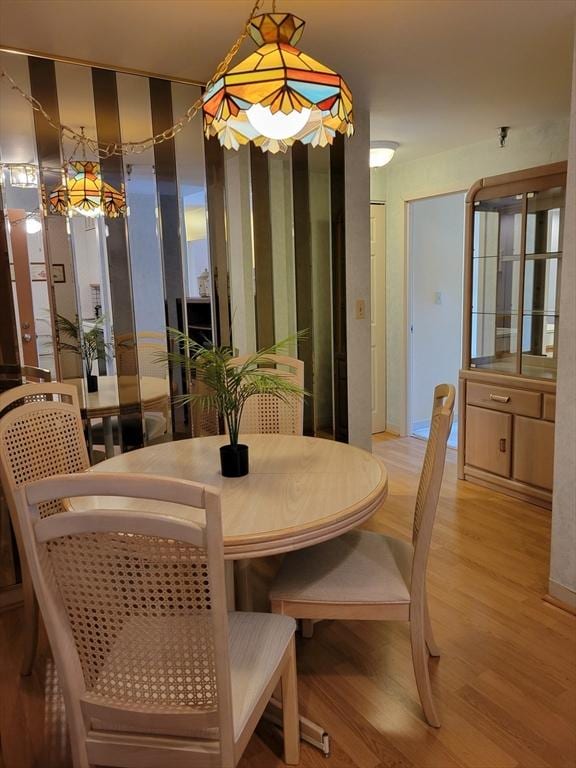 dining area with light wood-type flooring