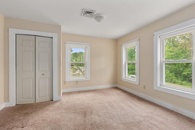 1123 E St, Ludlow, MA 01056 - unfurnished bedroom featuring carpet, baseboards, and a closet