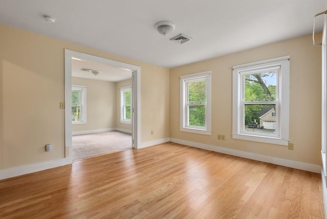 1123 E St, Ludlow, MA 01056 - spare room featuring light wood-type flooring, baseboards, and a smoke detector