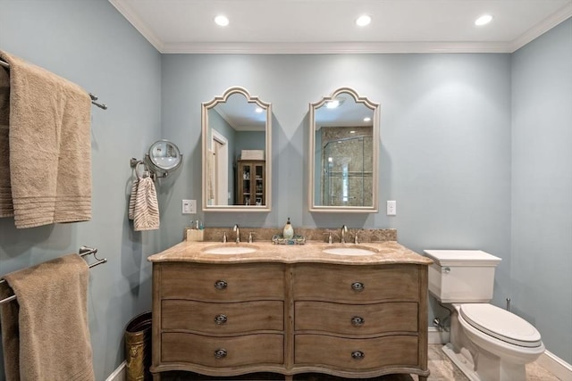 bathroom with vanity, a shower with shower door, ornamental molding, and toilet