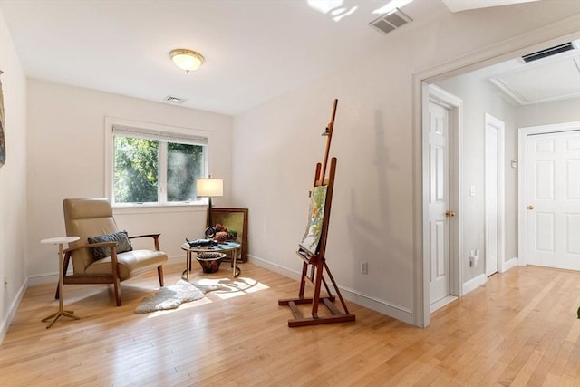 living area featuring light hardwood / wood-style floors