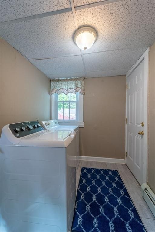 1349 Main St, Holden, MA 01520 - laundry room featuring washing machine and dryer, baseboard heating, and baseboards
