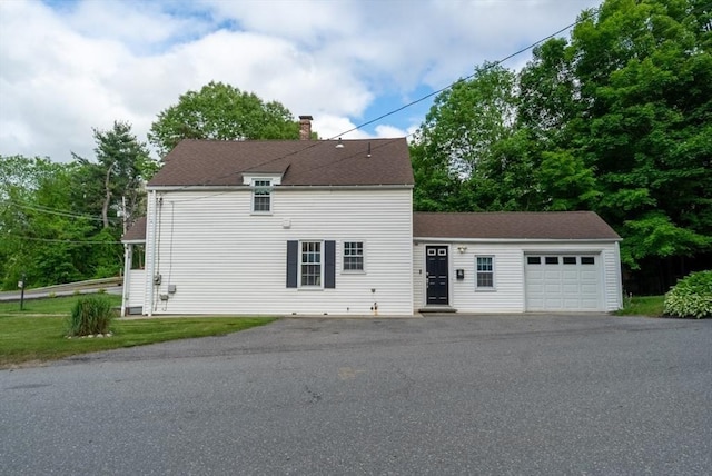 1349 Main St, Holden, MA 01520 - view of front of property with a chimney, a garage, and asphalt driveway