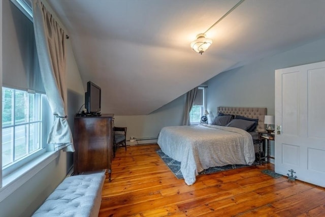 1349 Main St, Holden, MA 01520 - bedroom with a baseboard radiator, lofted ceiling, and hardwood / wood-style floors