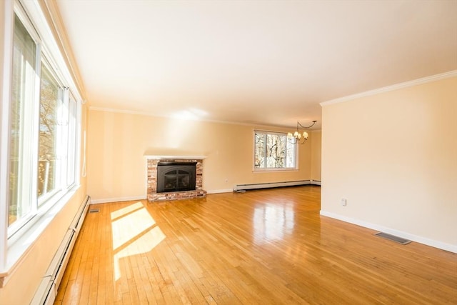 unfurnished living room featuring visible vents, a brick fireplace, baseboard heating, and light wood-type flooring