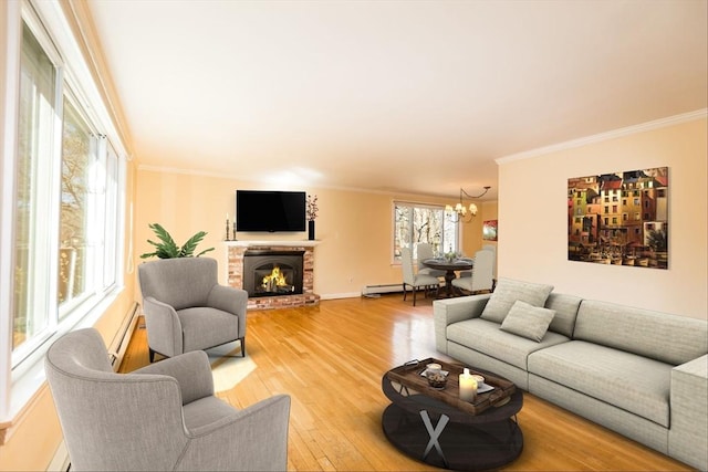 living area featuring a notable chandelier, light wood-style flooring, a fireplace, crown molding, and a baseboard radiator