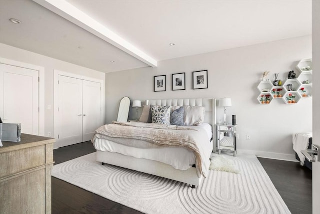 14 W Broadway Unit 903, Boston, MA 02127 - bedroom featuring beam ceiling, baseboards, wood finished floors, a closet, and recessed lighting