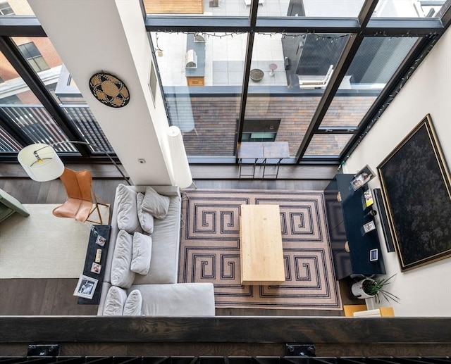 14 W Broadway Unit 903, Boston, MA 02127 - living room featuring a high ceiling and wood finished floors