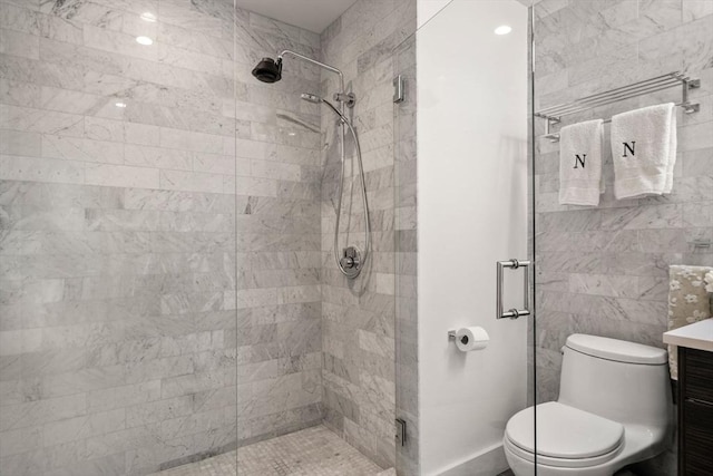 14 W Broadway Unit 903, Boston, MA 02127 - bathroom featuring vanity, toilet, and a stall shower