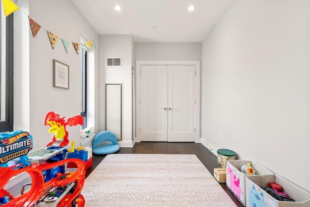 14 W Broadway Unit 903, Boston, MA 02127 - recreation room featuring dark wood-style flooring, recessed lighting, and baseboards