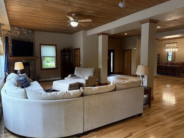 3 Wolf Rd, Bourne, MA 02532 - living room with wood ceiling, a baseboard heating unit, light wood-style floors, ornate columns, and ceiling fan