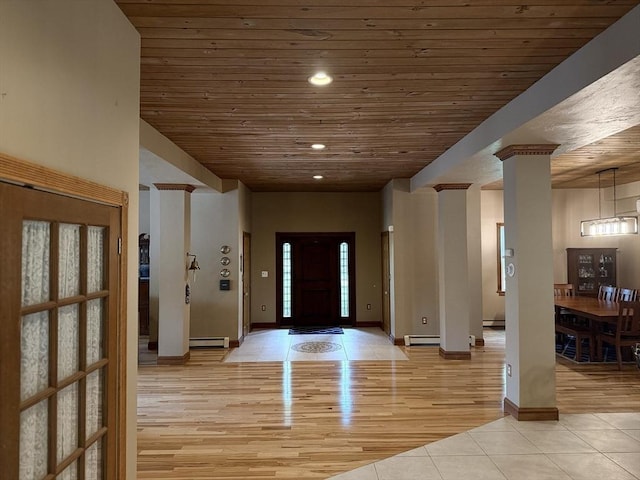 3 Wolf Rd, Bourne, MA 02532 - entryway with wooden ceiling, ornate columns, light tile patterned floors, recessed lighting, and baseboards